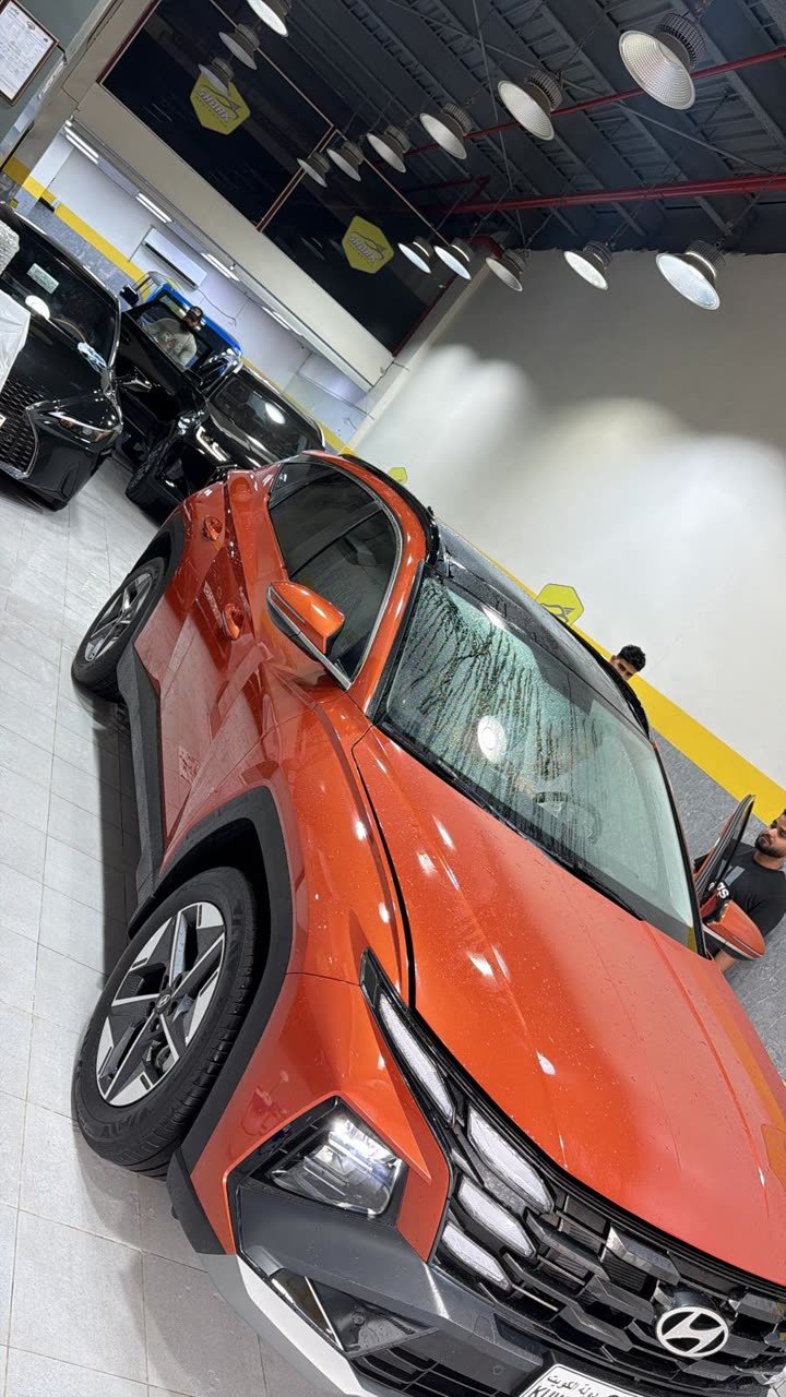 Orange Hyundai Creta being protected at the studio