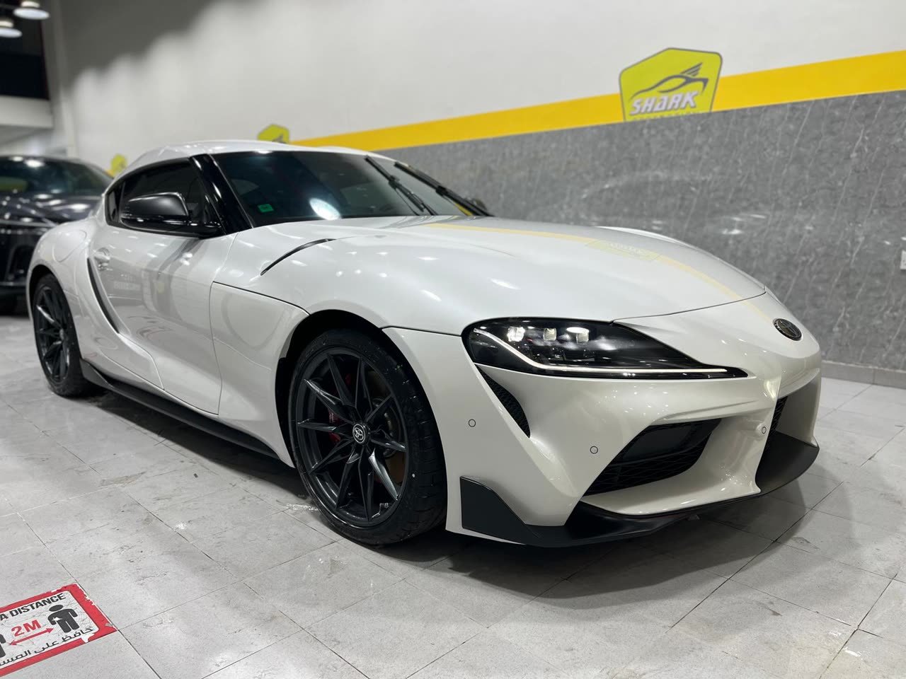 White Toyota GR Supra at the studio
